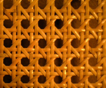closeup of hexogonal cane seating weave